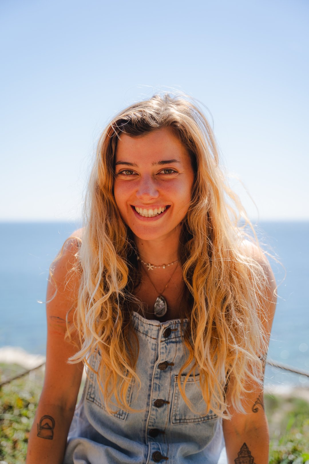 Karolina, founder of SeaMiLeS, by the sea